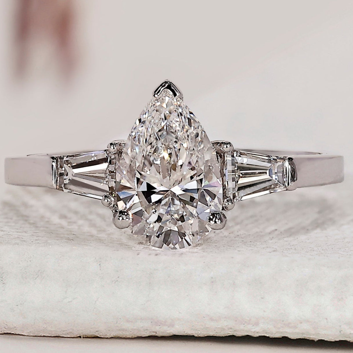 Teardrop Diamond Ring With 2 Tapered Baguette Side Stone