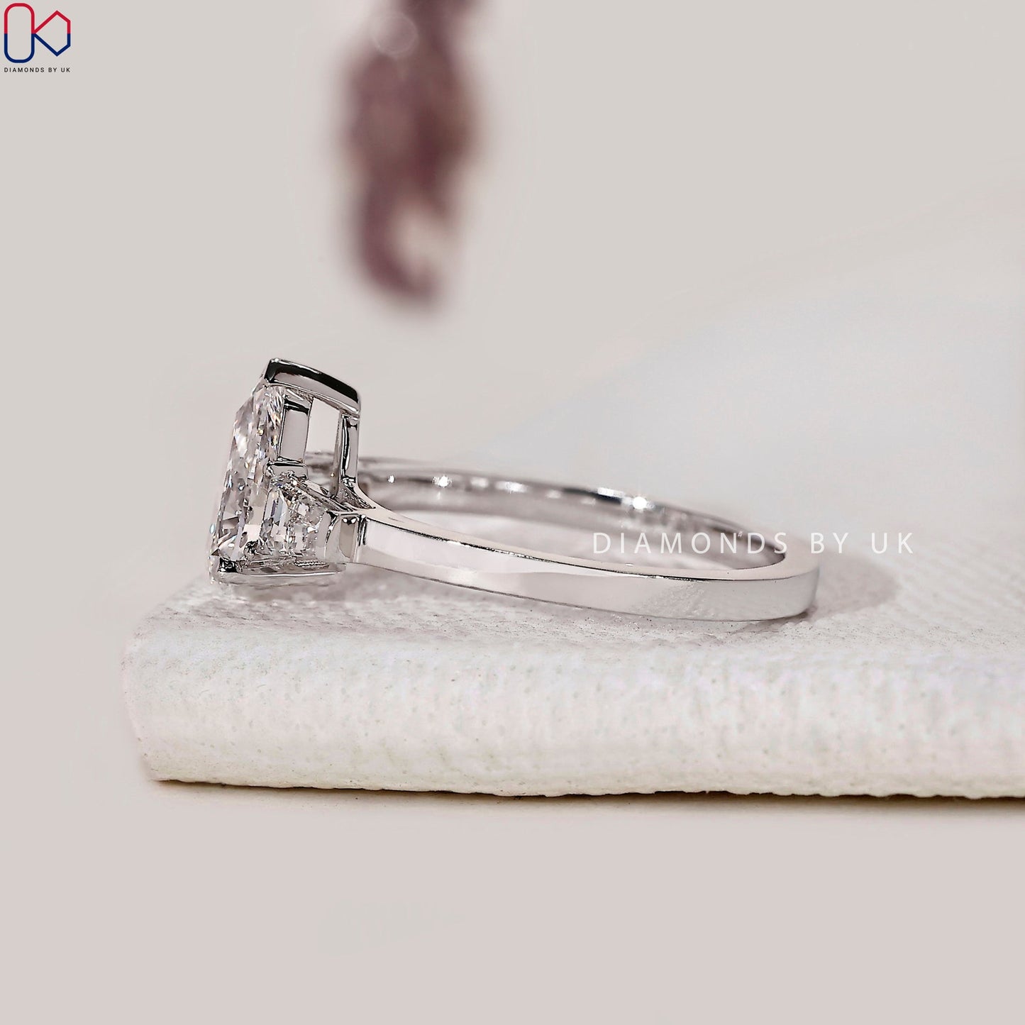 Teardrop Diamond Ring With 2 Tapered Baguette Side Stone
