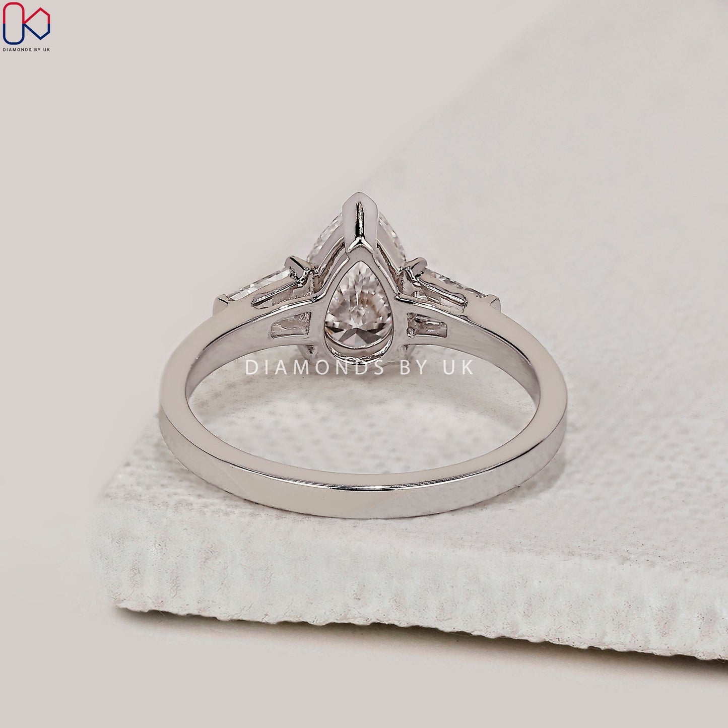 Teardrop Diamond Ring With 2 Tapered Baguette Side Stone