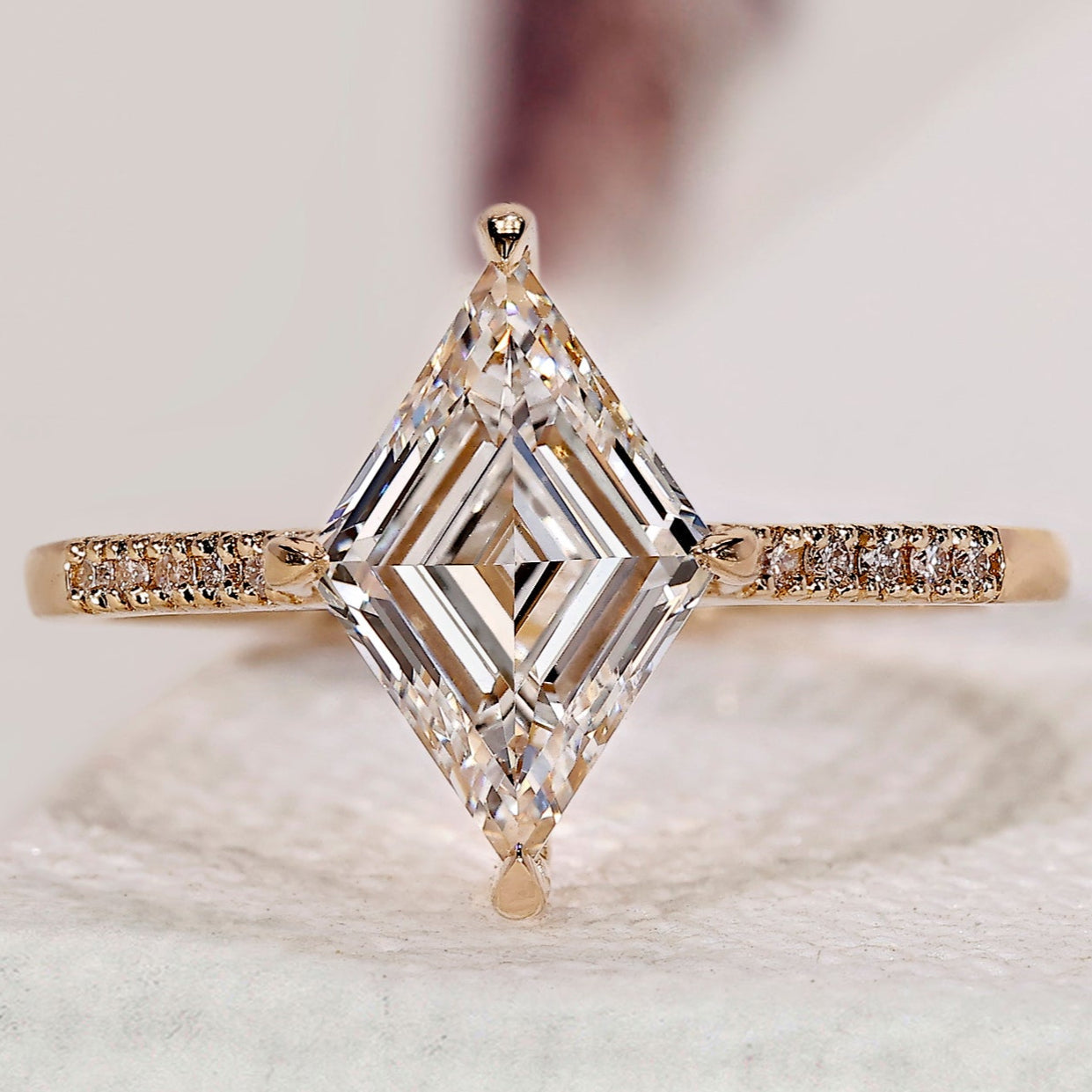 Lozenge Cut Diamond Ring With Compass prong