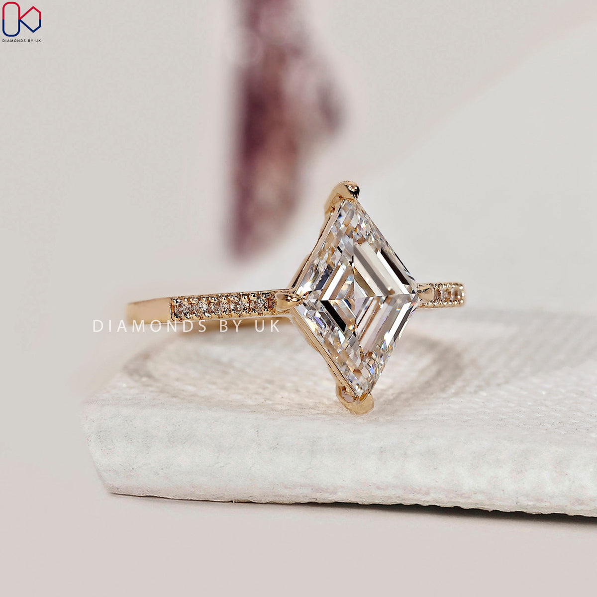 Lozenge Cut Diamond Ring With Compass prong