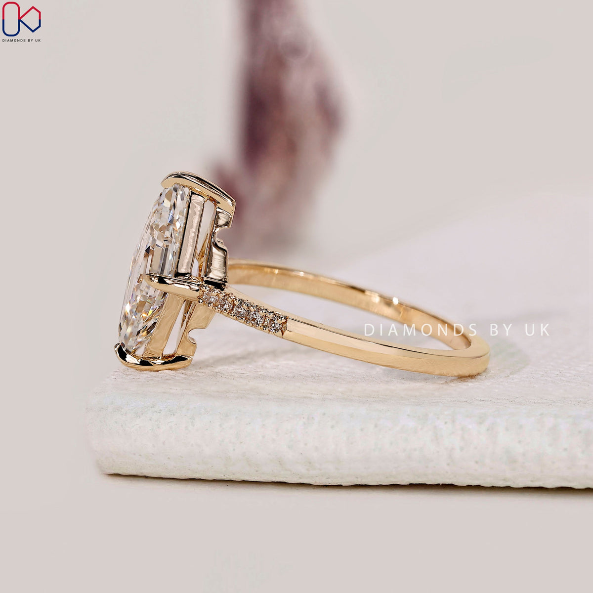 Lozenge Cut Diamond Ring With Compass prong
