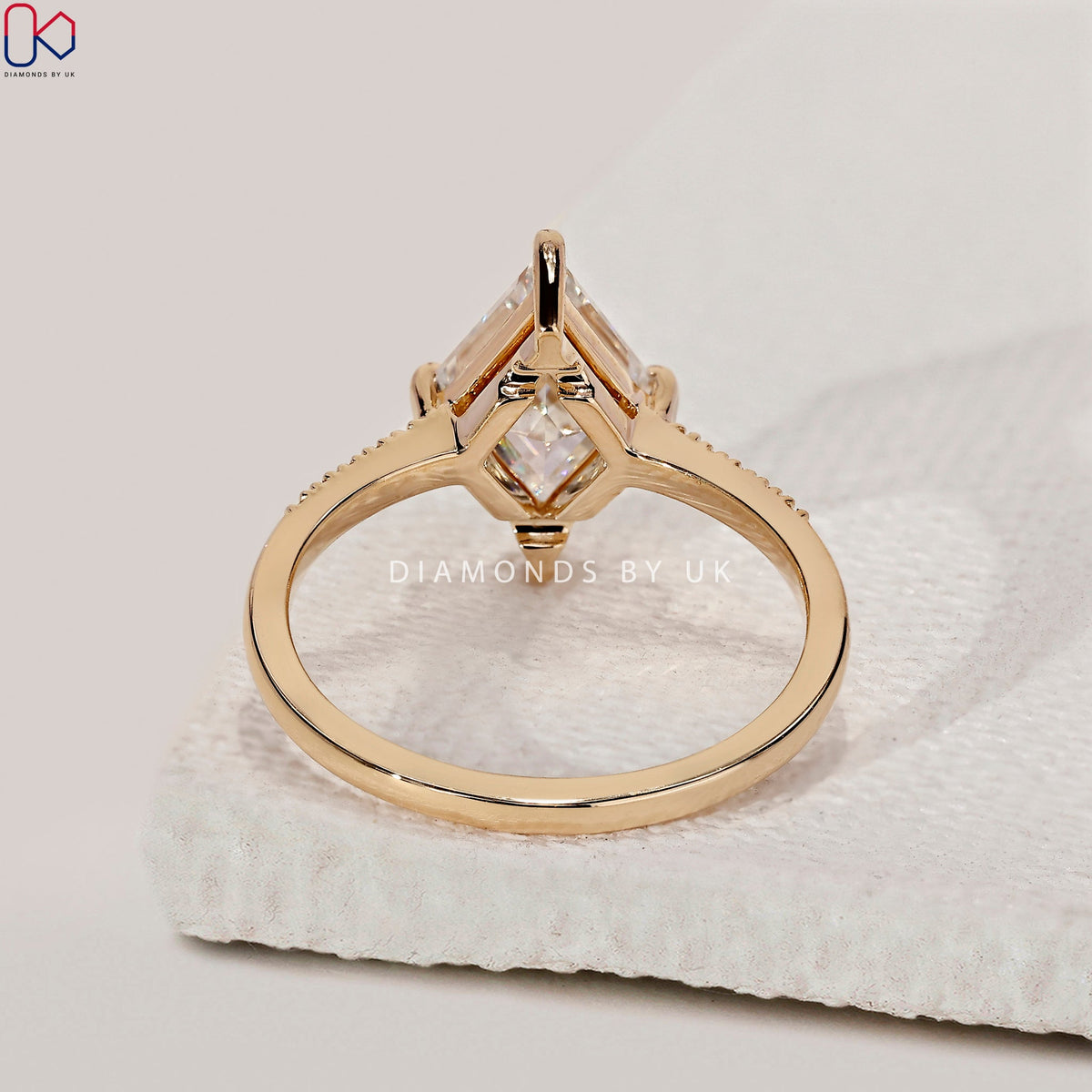 Lozenge Cut Diamond Ring With Compass prong
