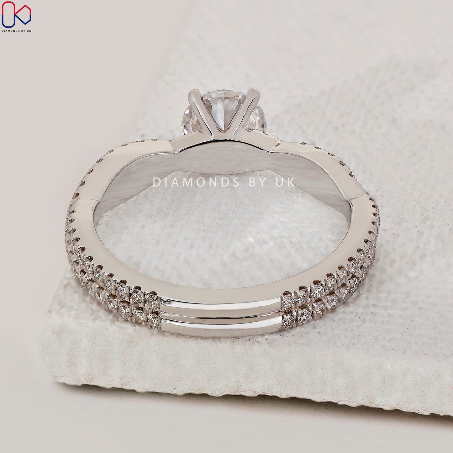 Round Cut Diamond Ring With Twisted Pave Set