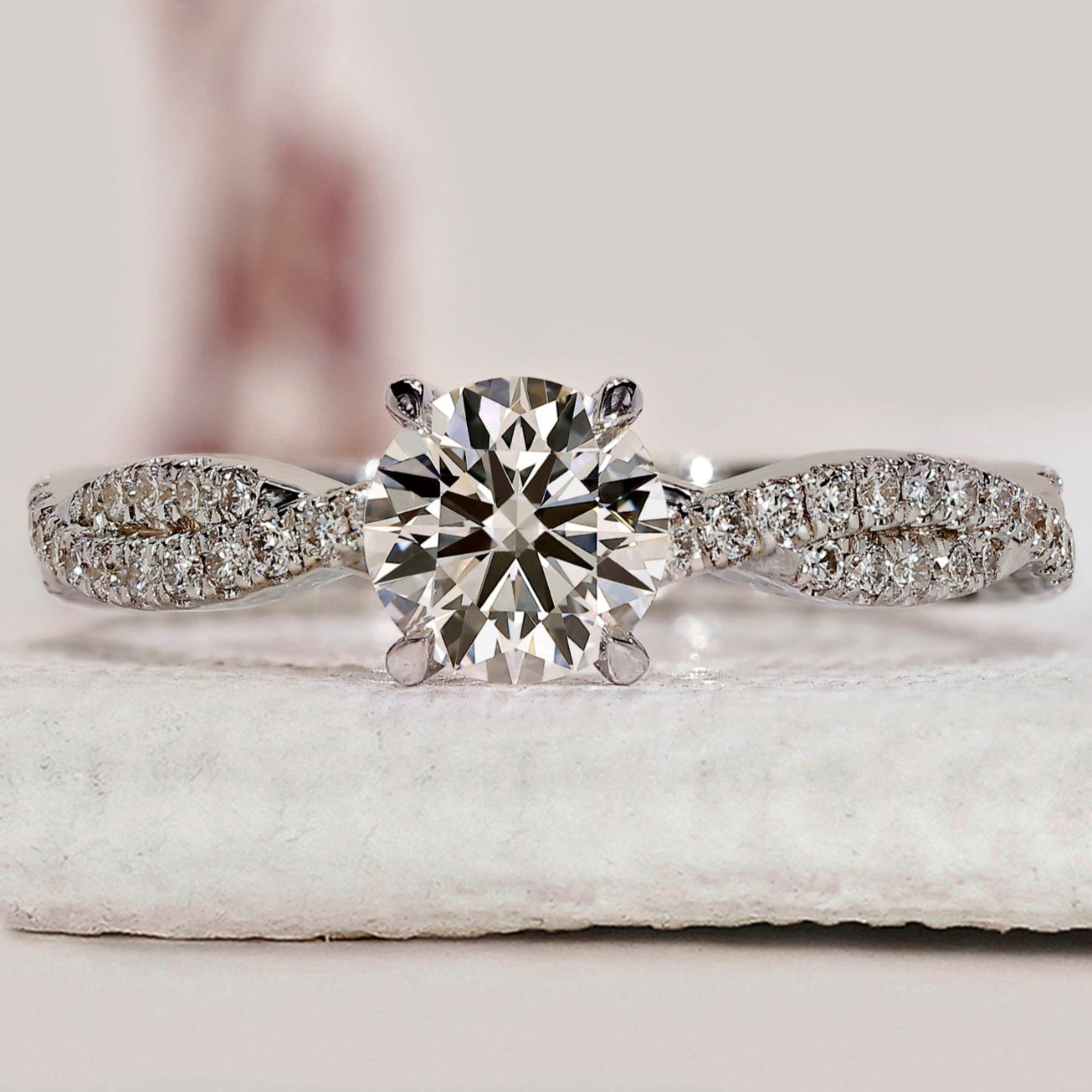 Round Cut Diamond Ring With Twisted Pave Set