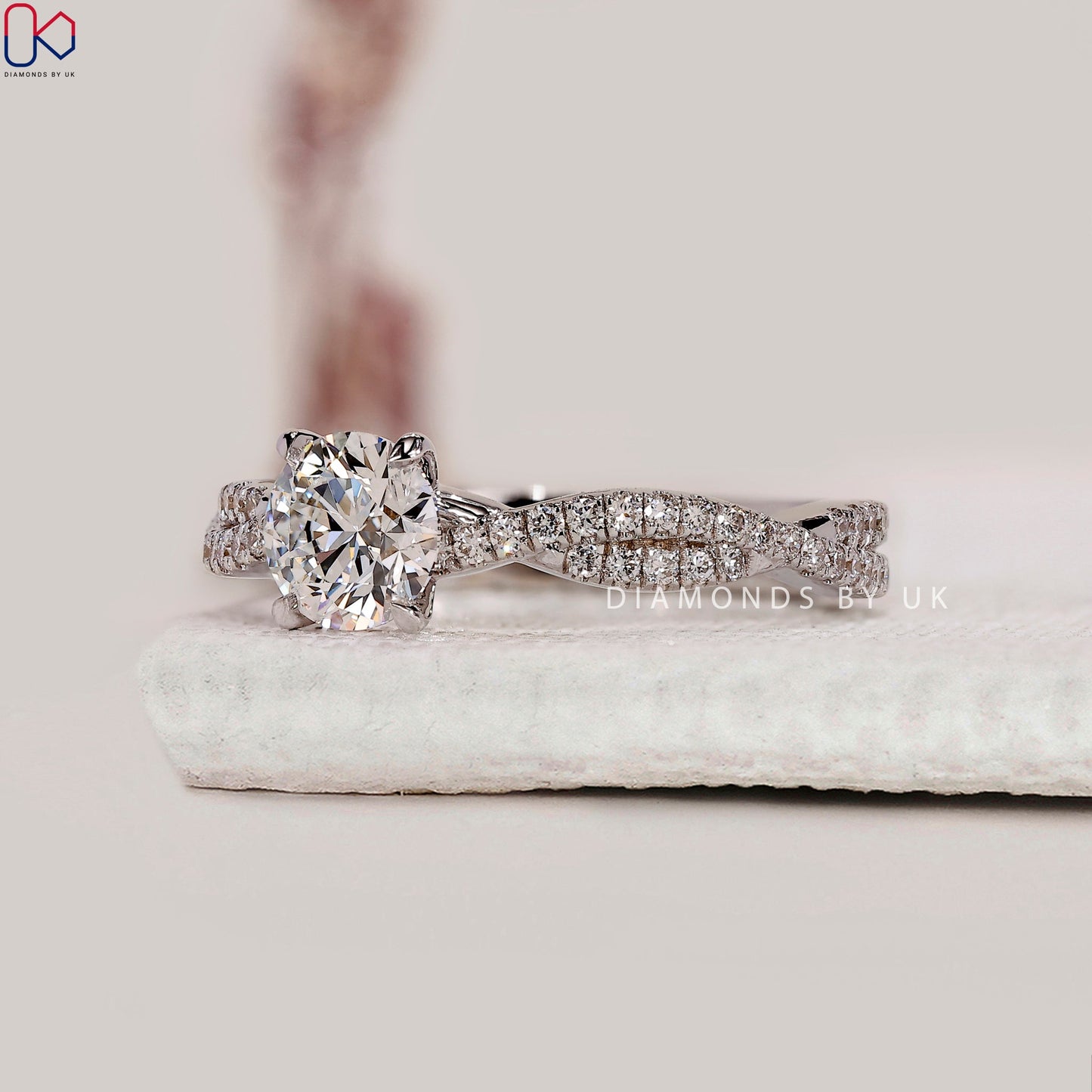 Round Cut Diamond Ring With Twisted Pave Set