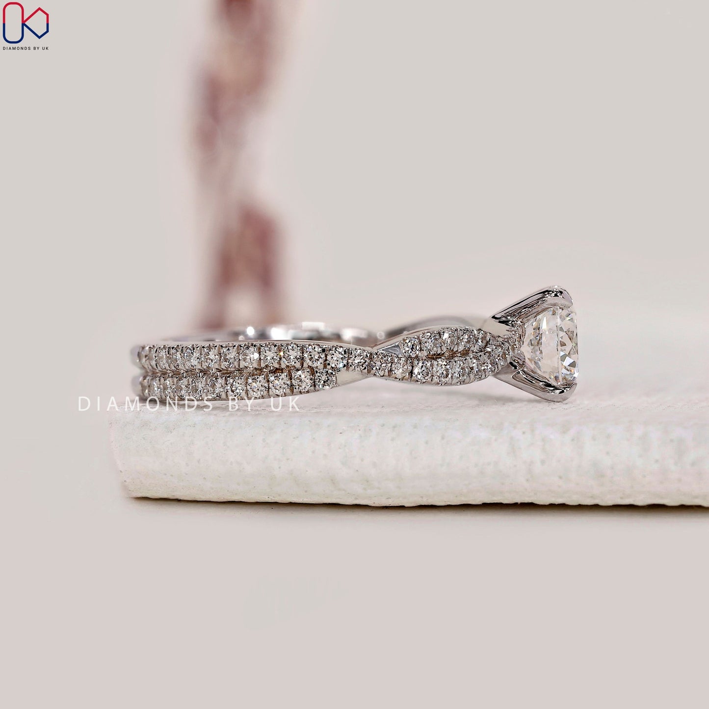 Round Cut Diamond Ring With Twisted Pave Set
