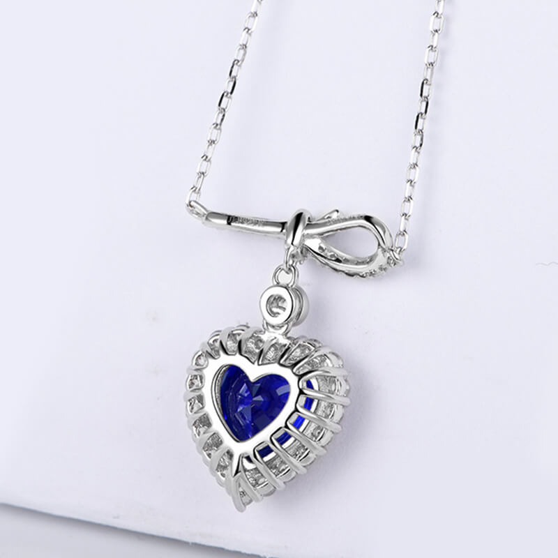 Halo Heart Sapphire Knot Necklace In Sterling Silver