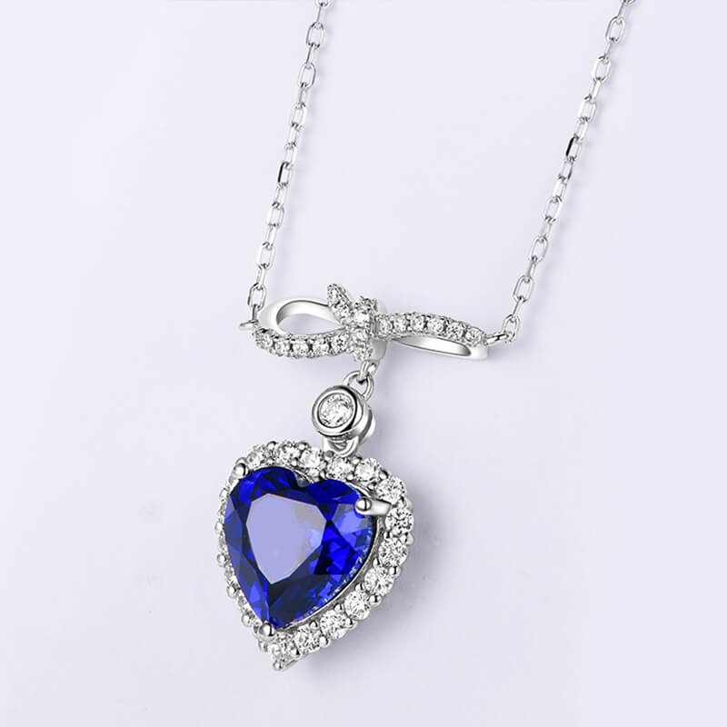 Halo Heart Sapphire Knot Necklace In Sterling Silver