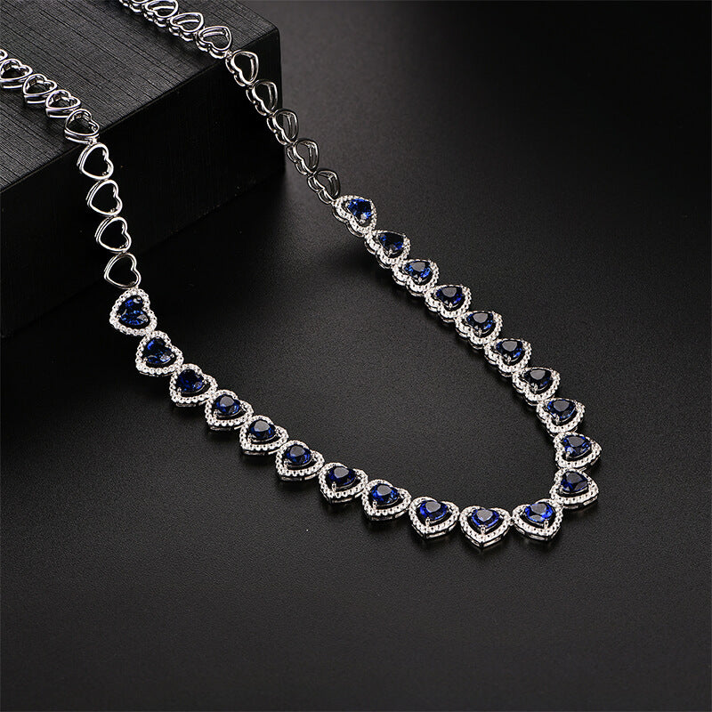 Halo Heart Sapphire Tennis Necklace In Sterling Silver