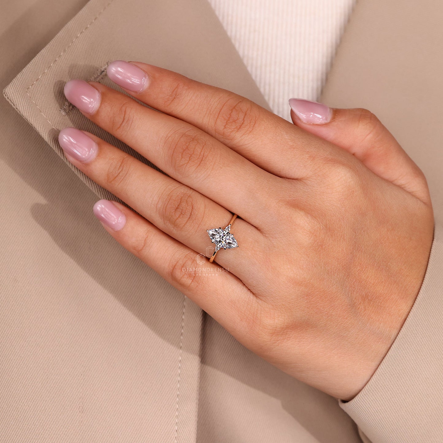 Marquise and Pear Cut Three Stone Engagement Ring