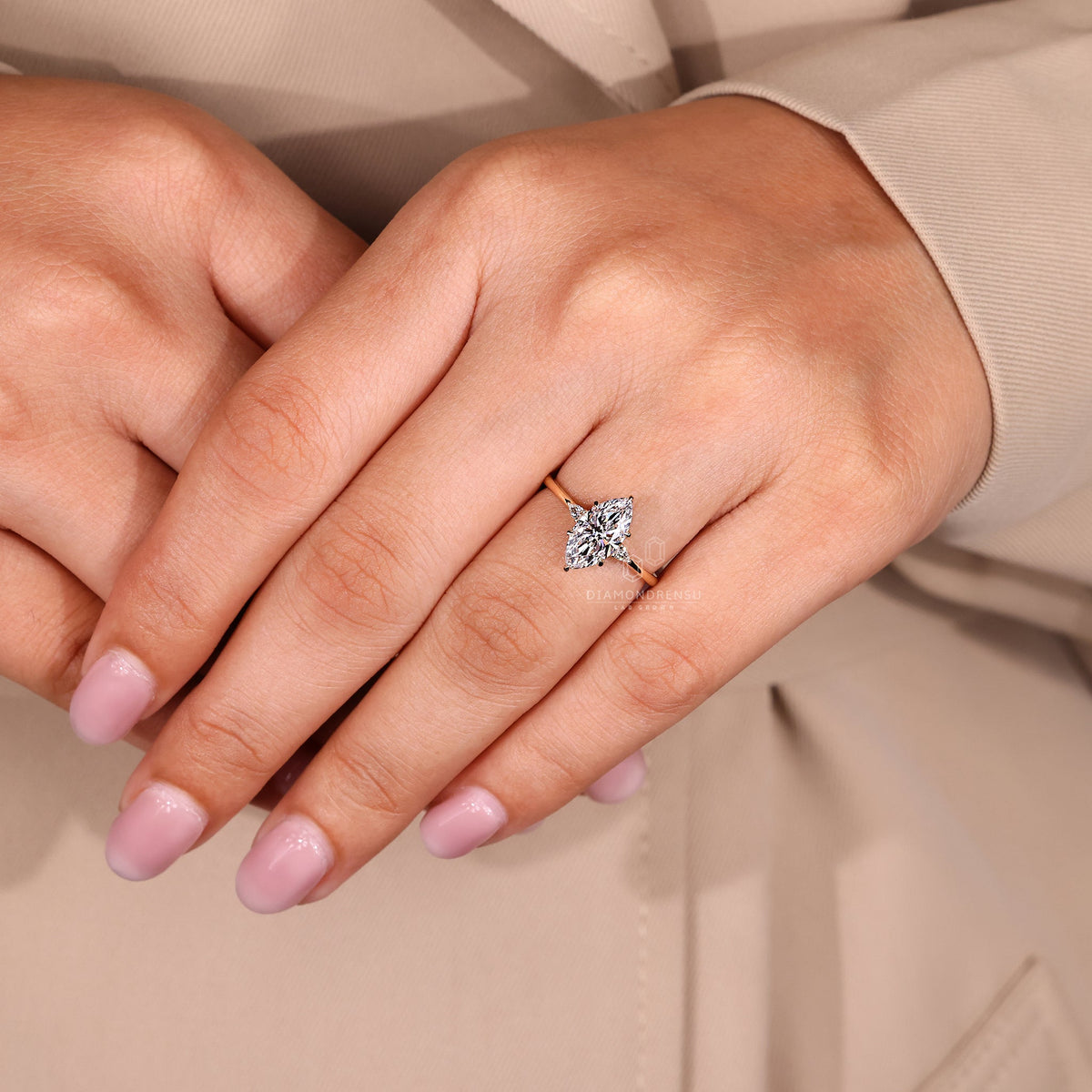 Marquise and Pear Cut Three Stone Engagement Ring