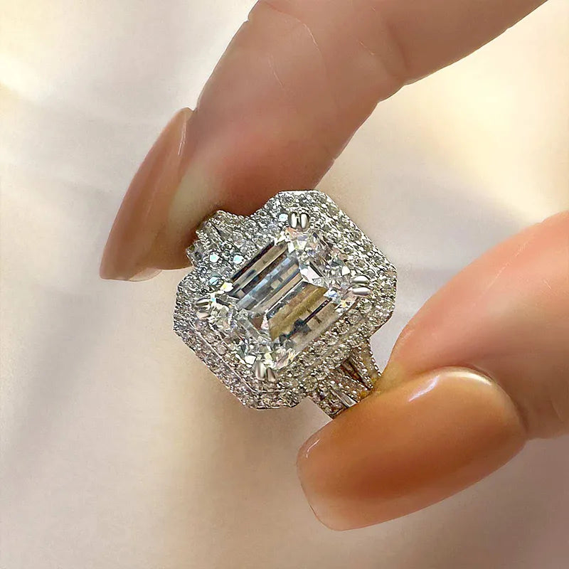 Opulent Emerald Cut 3.0ct Split Shank 925 Sterling Silver Wedding Ring Set