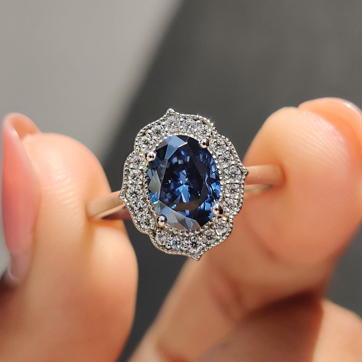 Blue Oval Moissanite Engagement Ring with Milgrain Details