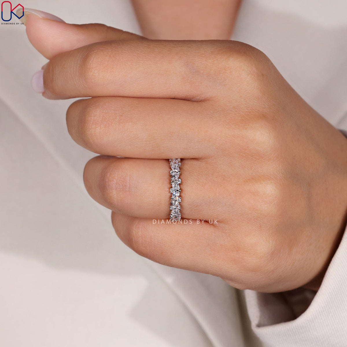Pear And Round Wedding Band In White Gold
