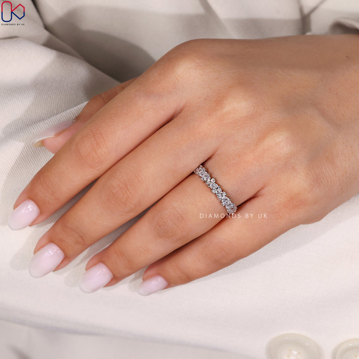 Pear And Round Wedding Band In White Gold