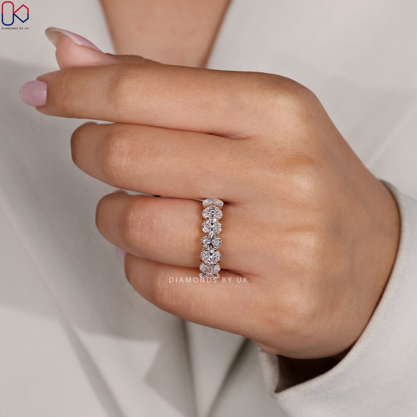 Half Eternity Oval Cut Diamond Band