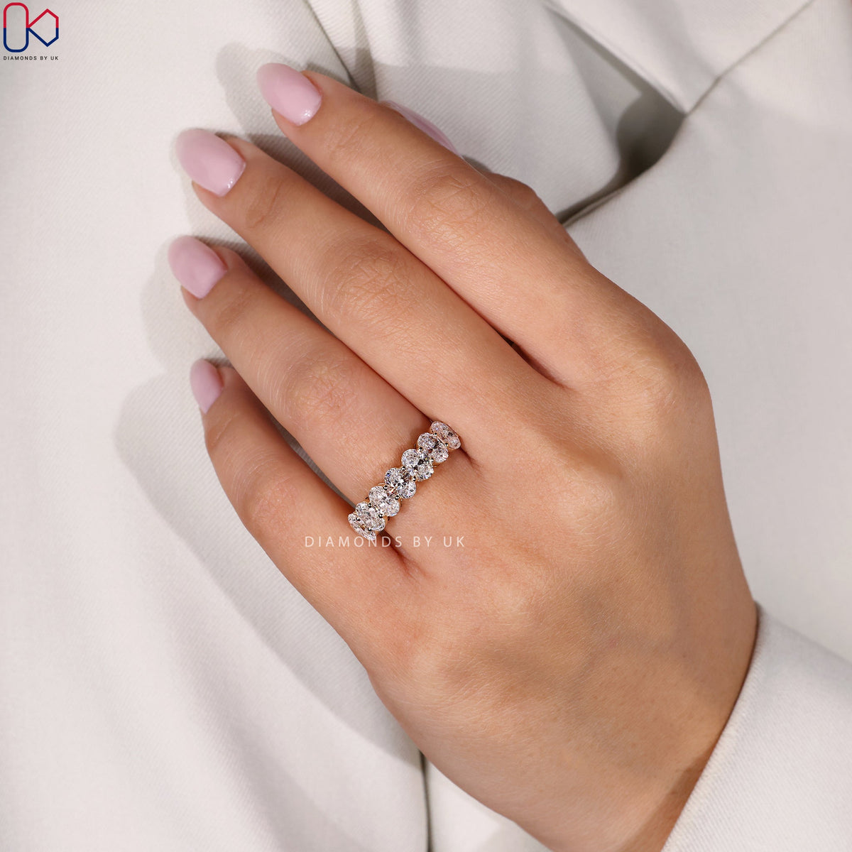 Half Eternity Oval Cut Diamond Band