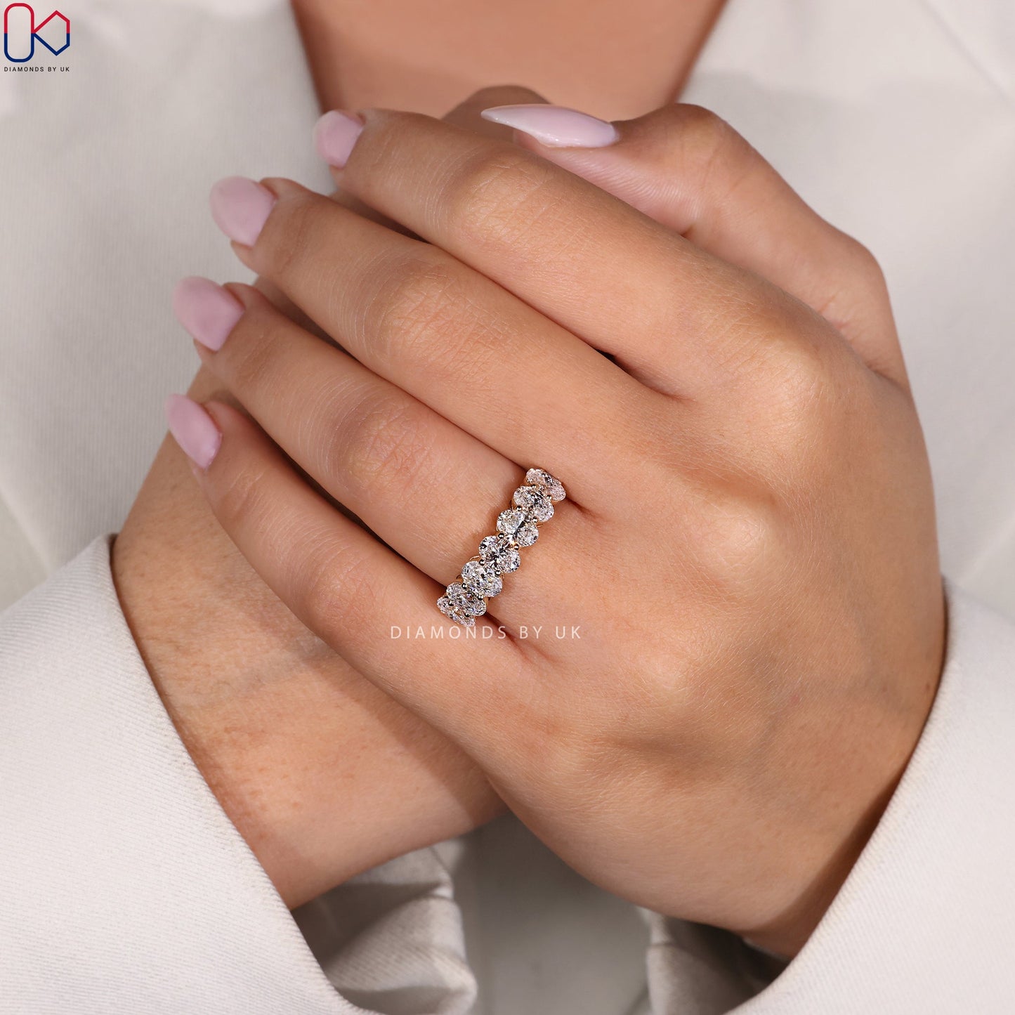 Half Eternity Oval Cut Diamond Band
