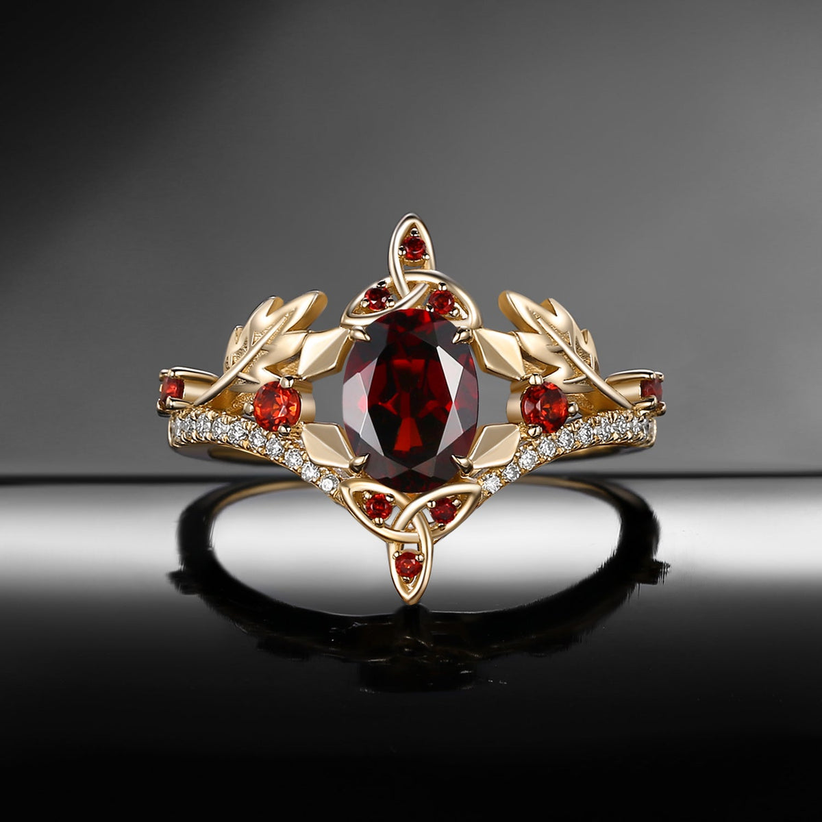 Celtic Calendar | 12.24-1.20 | Oval Garnet Nature Inspired Birch Leafy Celtic Ring