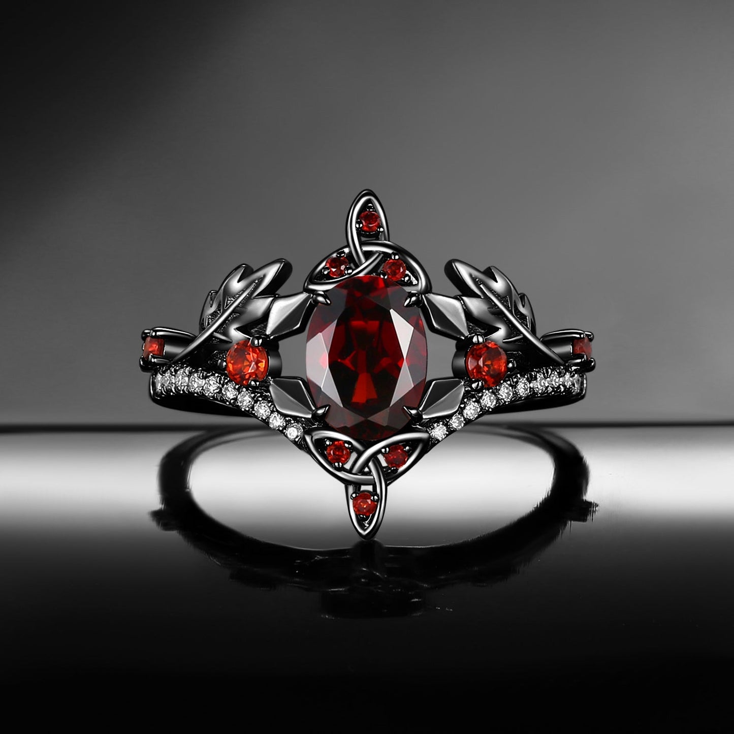 Celtic Calendar | 12.24-1.20 | Oval Garnet Nature Inspired Birch Leafy Celtic Ring