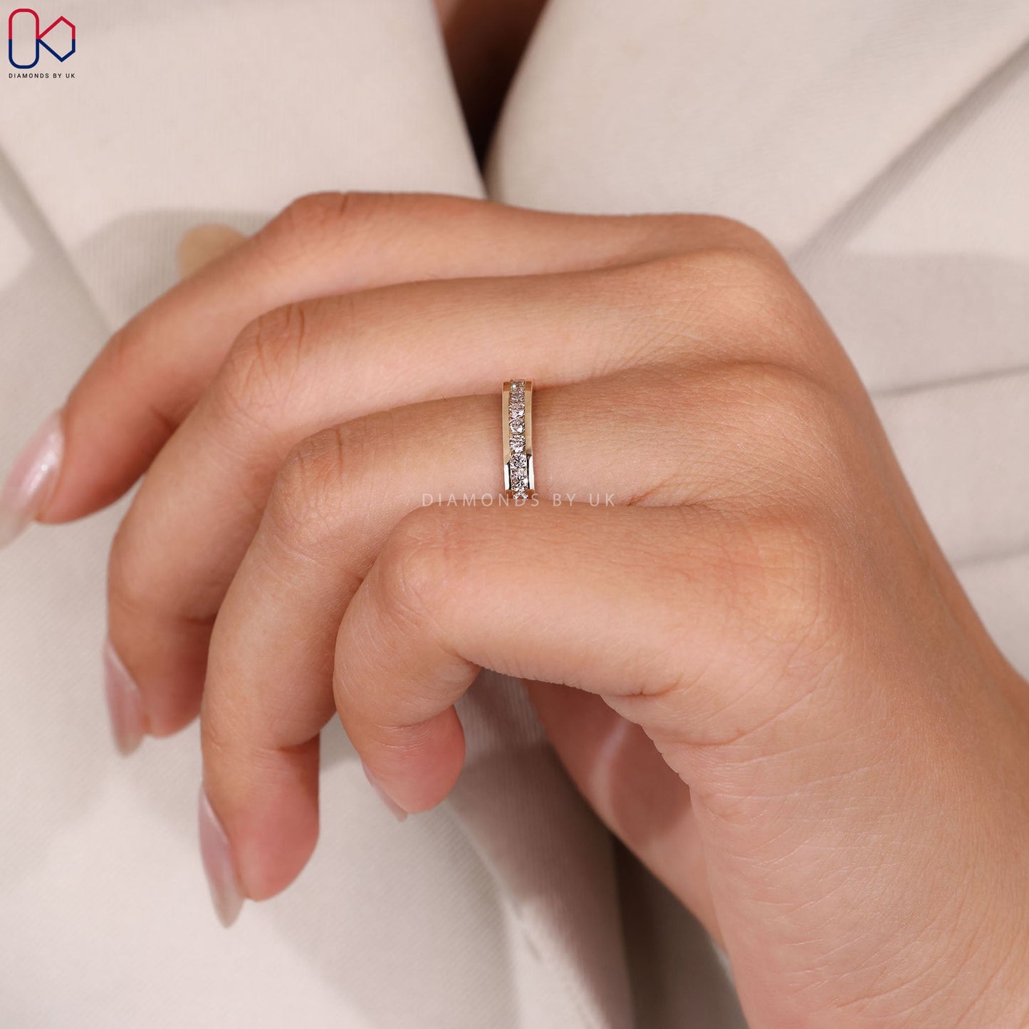 Yellow Gold Channel Set Round Diamond Band
