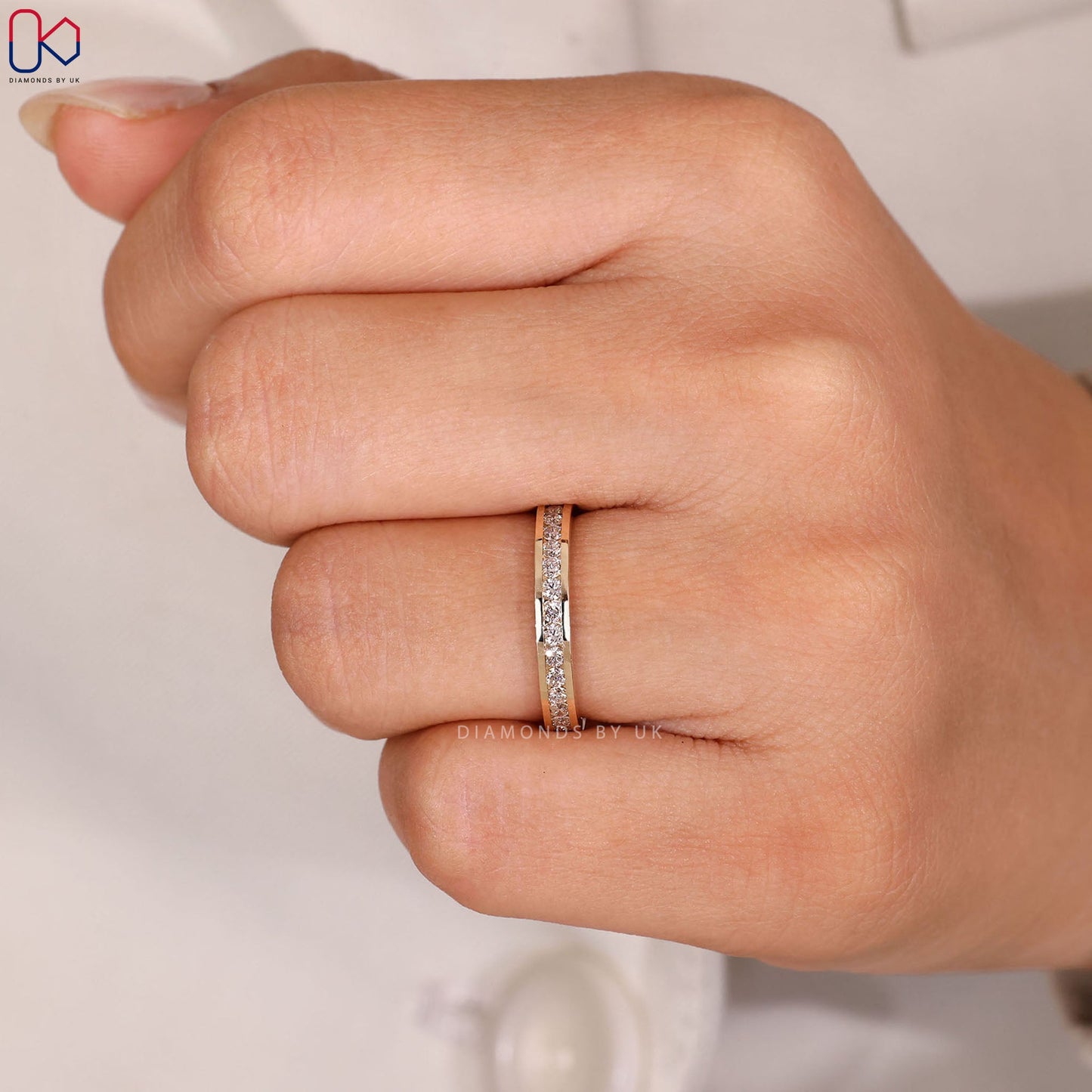 Yellow Gold Channel Set Round Diamond Band