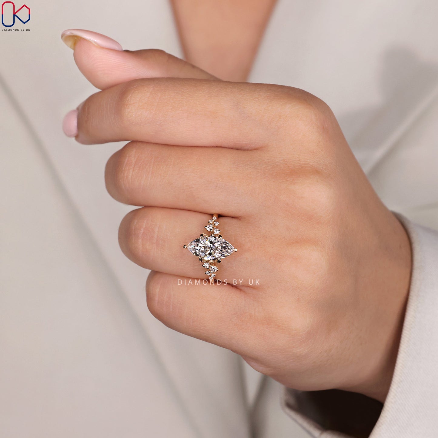 Yellow Gold Marquise Engagement Ring with Side Stone