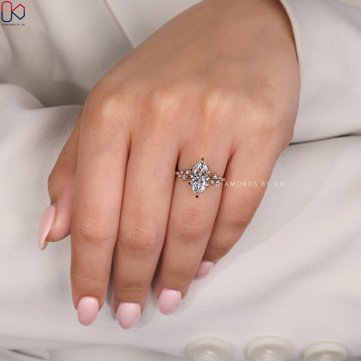 Yellow Gold Marquise Engagement Ring with Side Stone
