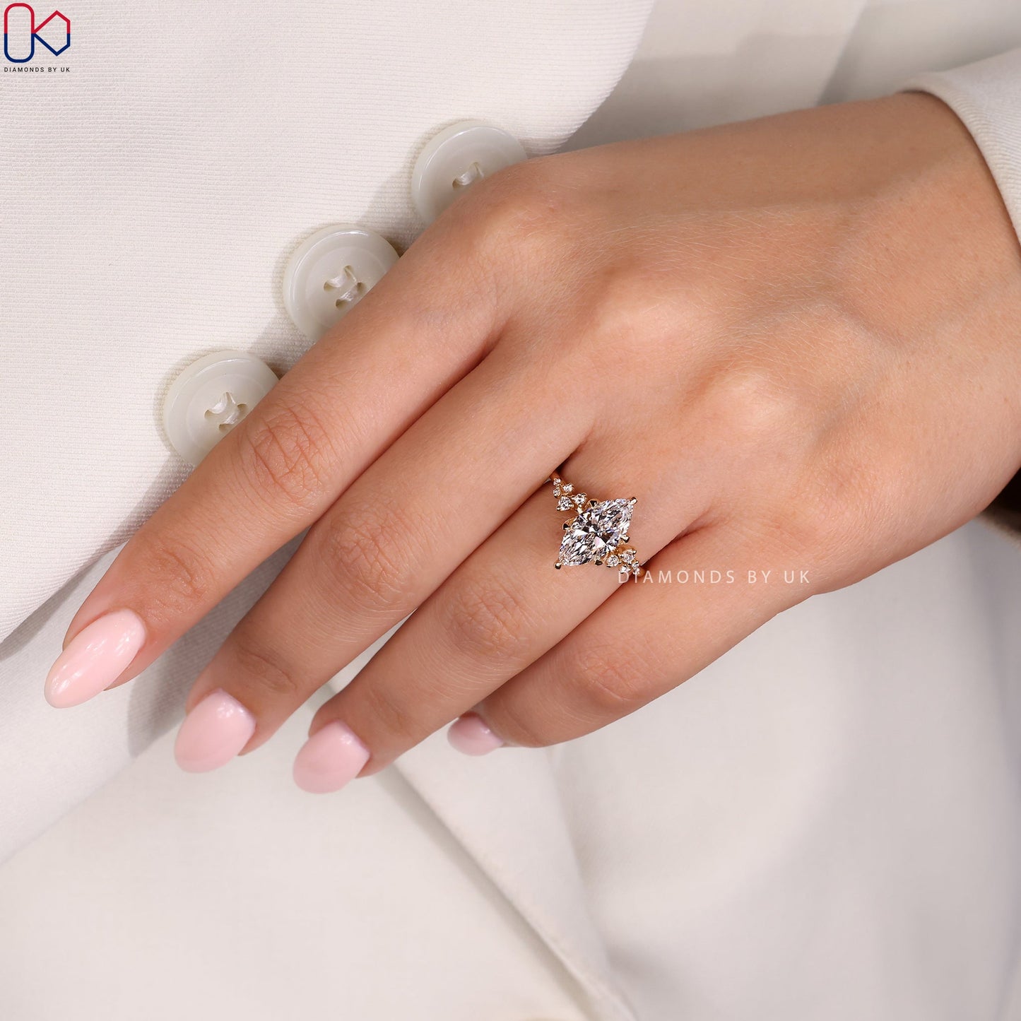 Yellow Gold Marquise Engagement Ring with Side Stone