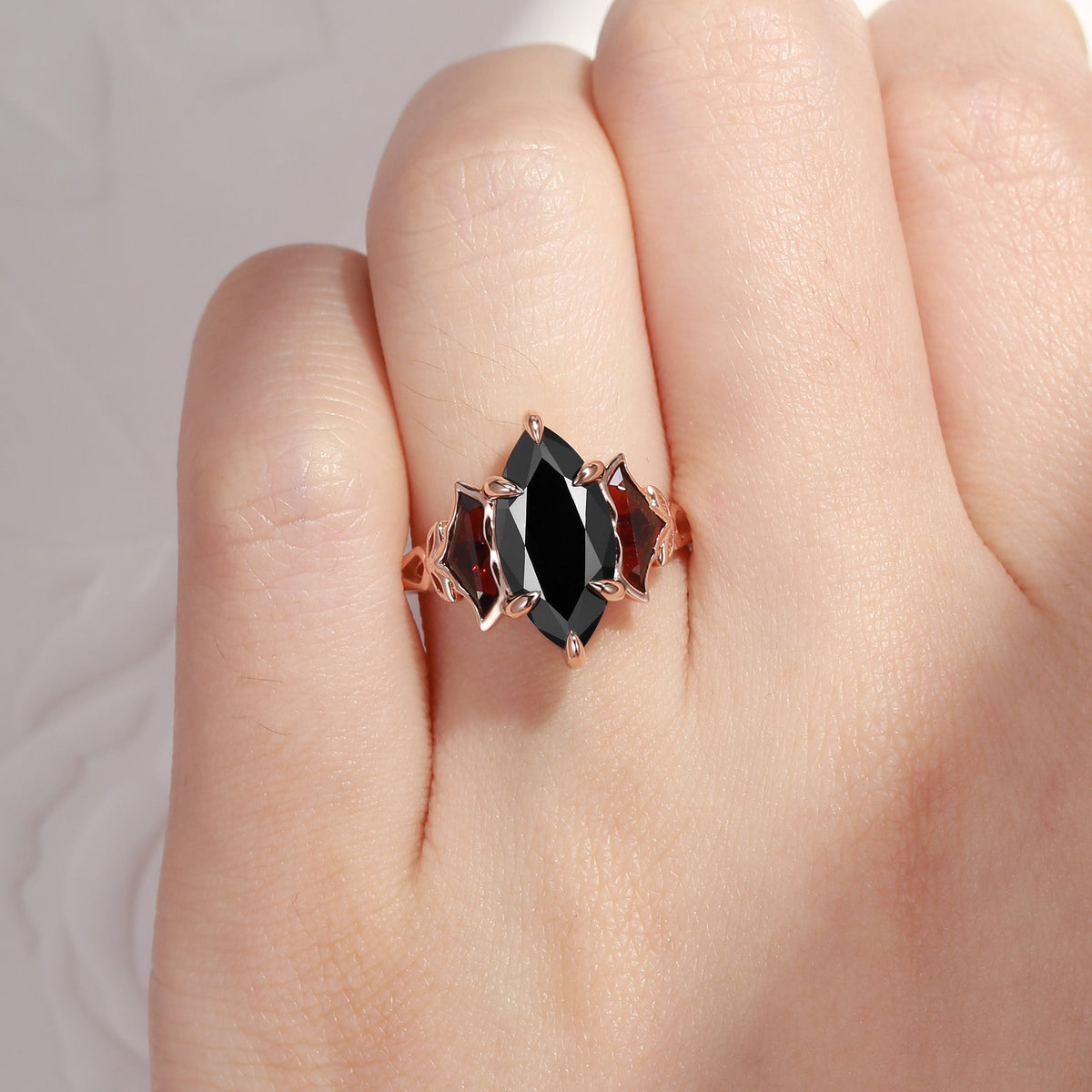 'The Winged Guardian' - Gothic Marquise Cut Black Moissanite Engagement Ring with Bat Wing Shaped Accent Stones