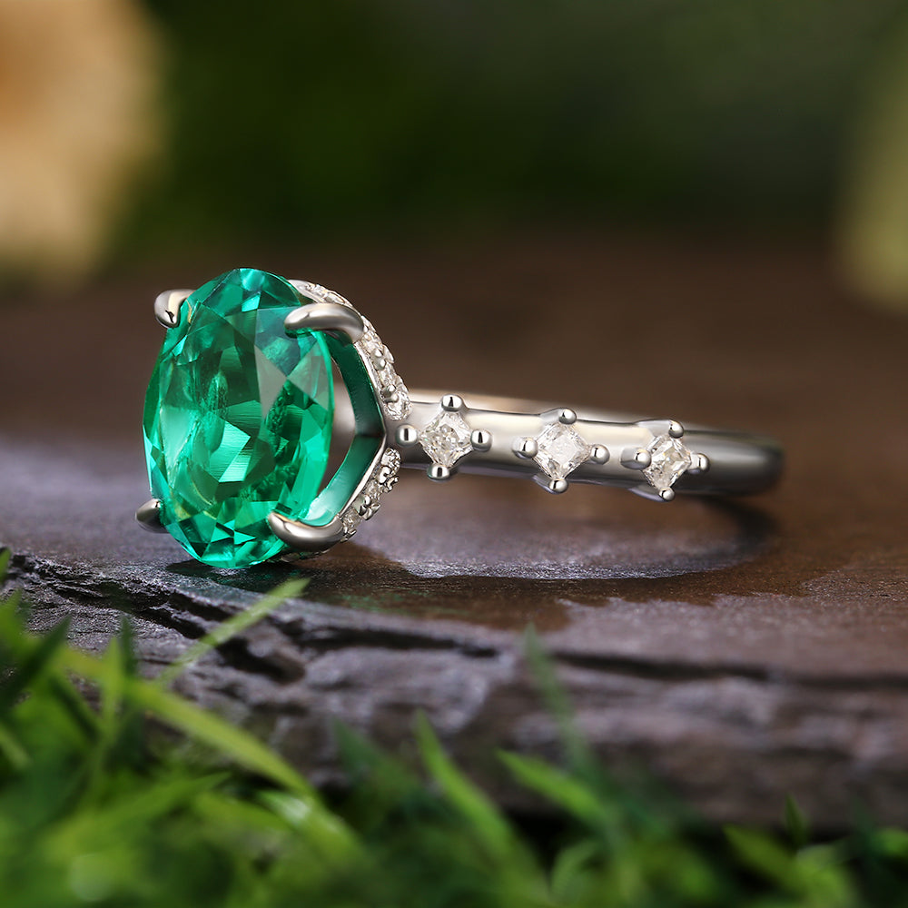 2.8 Ct Oval Cut Lab Emerald Hidden Halo with Princess Cut Moissanite Accents Vintage-Inspired Engagement Ring