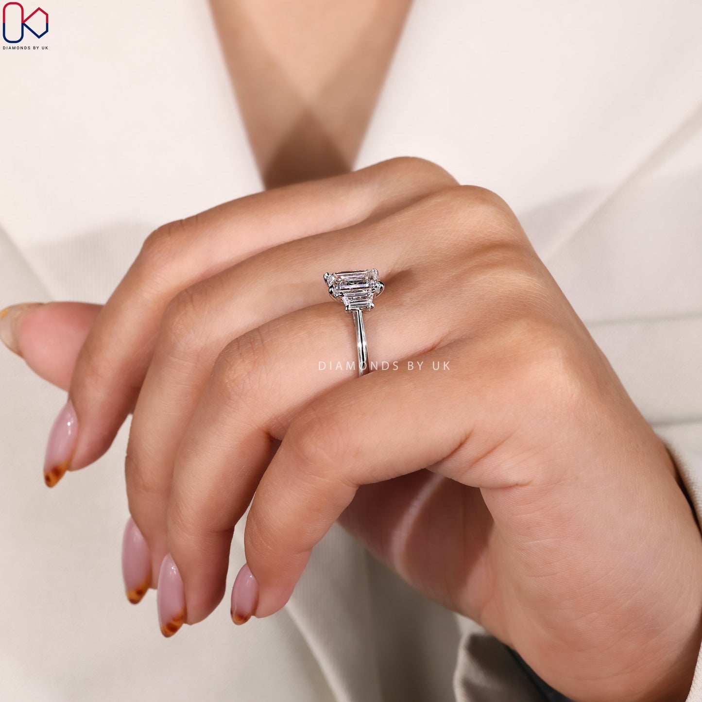 Emerald And Trapezoid Baguette 3 Stone Ring