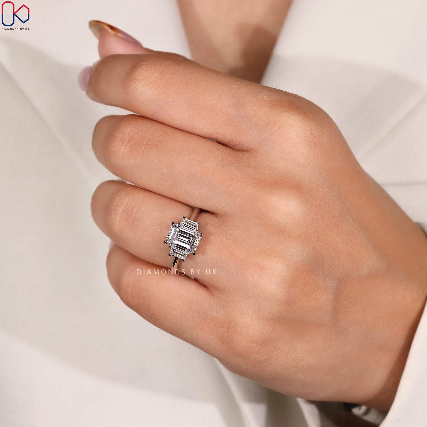 Emerald And Trapezoid Baguette 3 Stone Ring