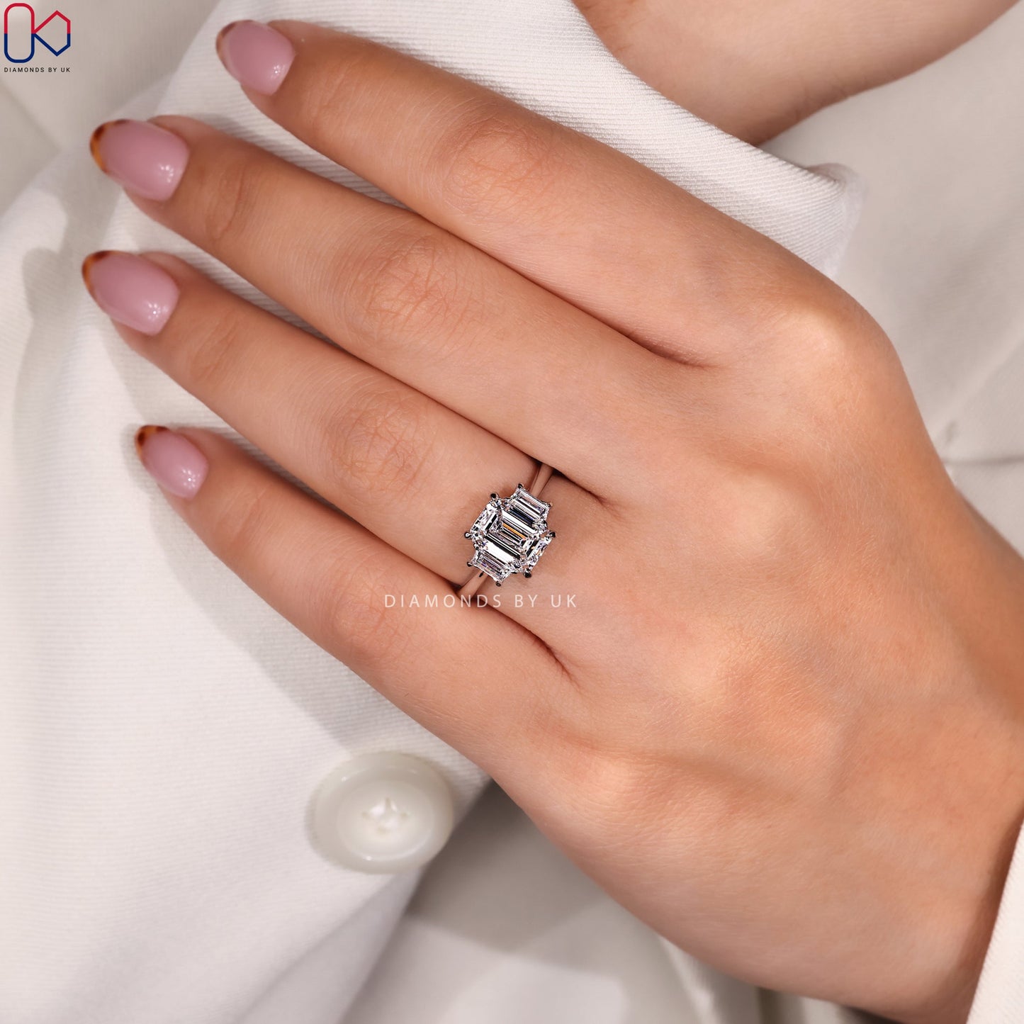 Emerald And Trapezoid Baguette 3 Stone Ring
