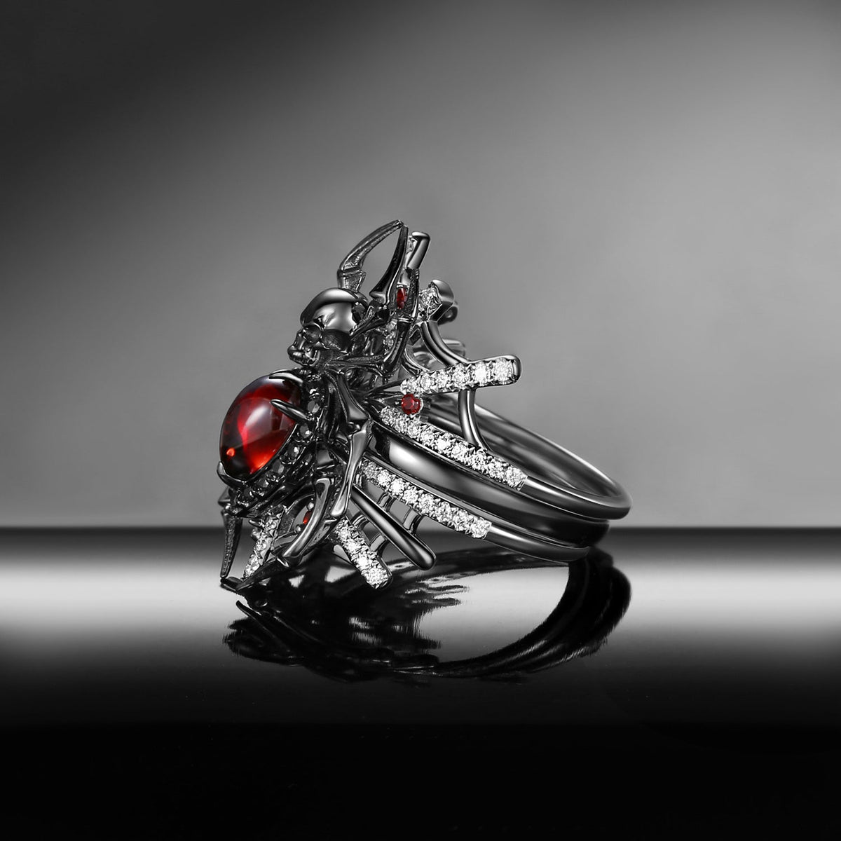 Spider Ring 'The Web' - Gothic Pear Cut Garnet Engagement Ring Set with Skull Inspired Band