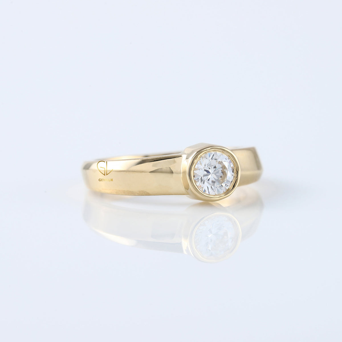 Bezel Set Round Moissanite Solitaire Yellow Gold Ring
