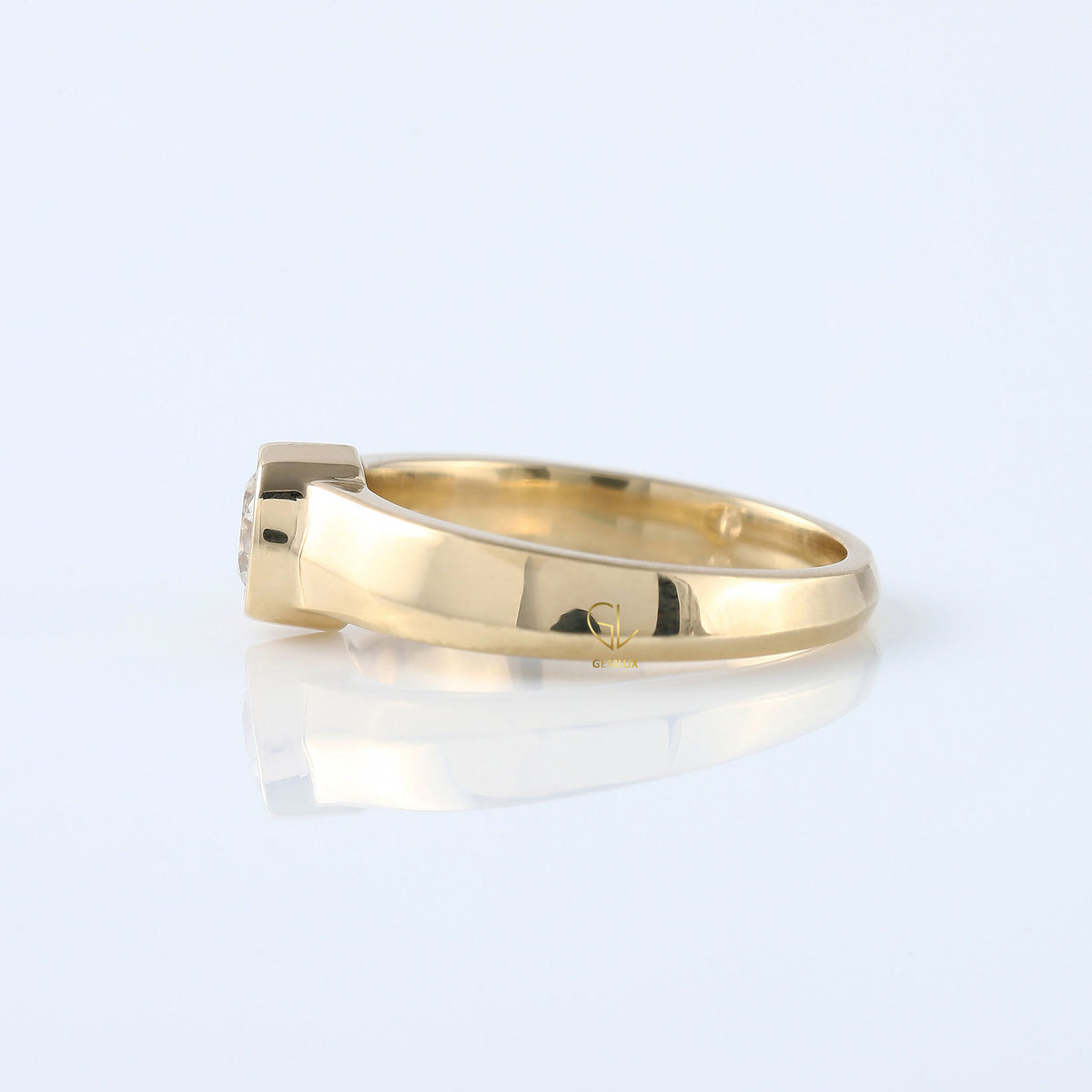 Bezel Set Round Moissanite Solitaire Yellow Gold Ring