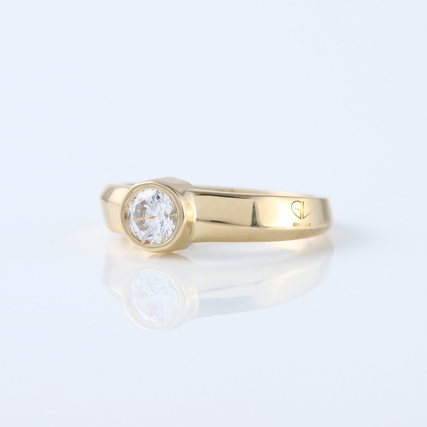 Bezel Set Round Moissanite Solitaire Yellow Gold Ring