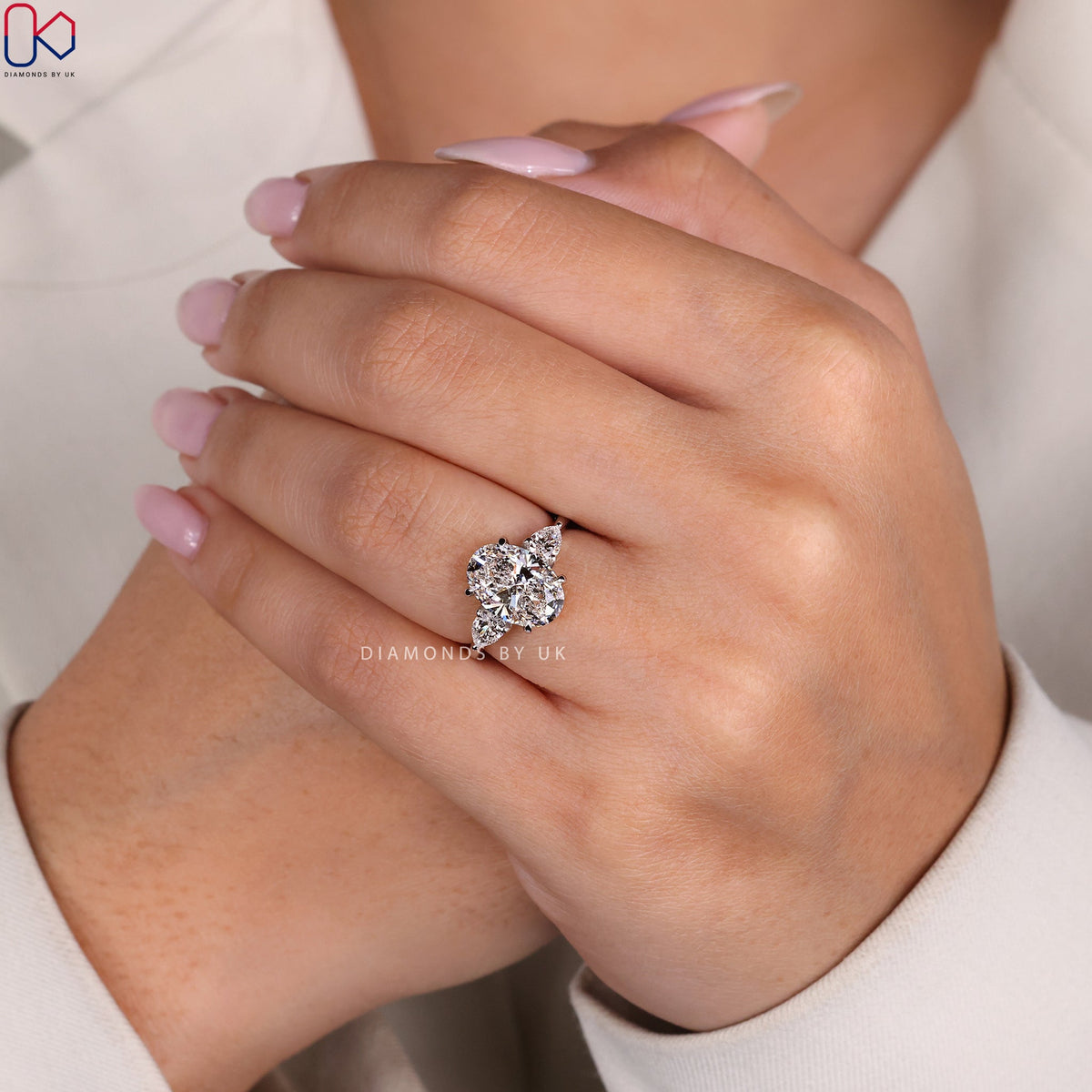 Oval Cut Three Stone Diamond Ring