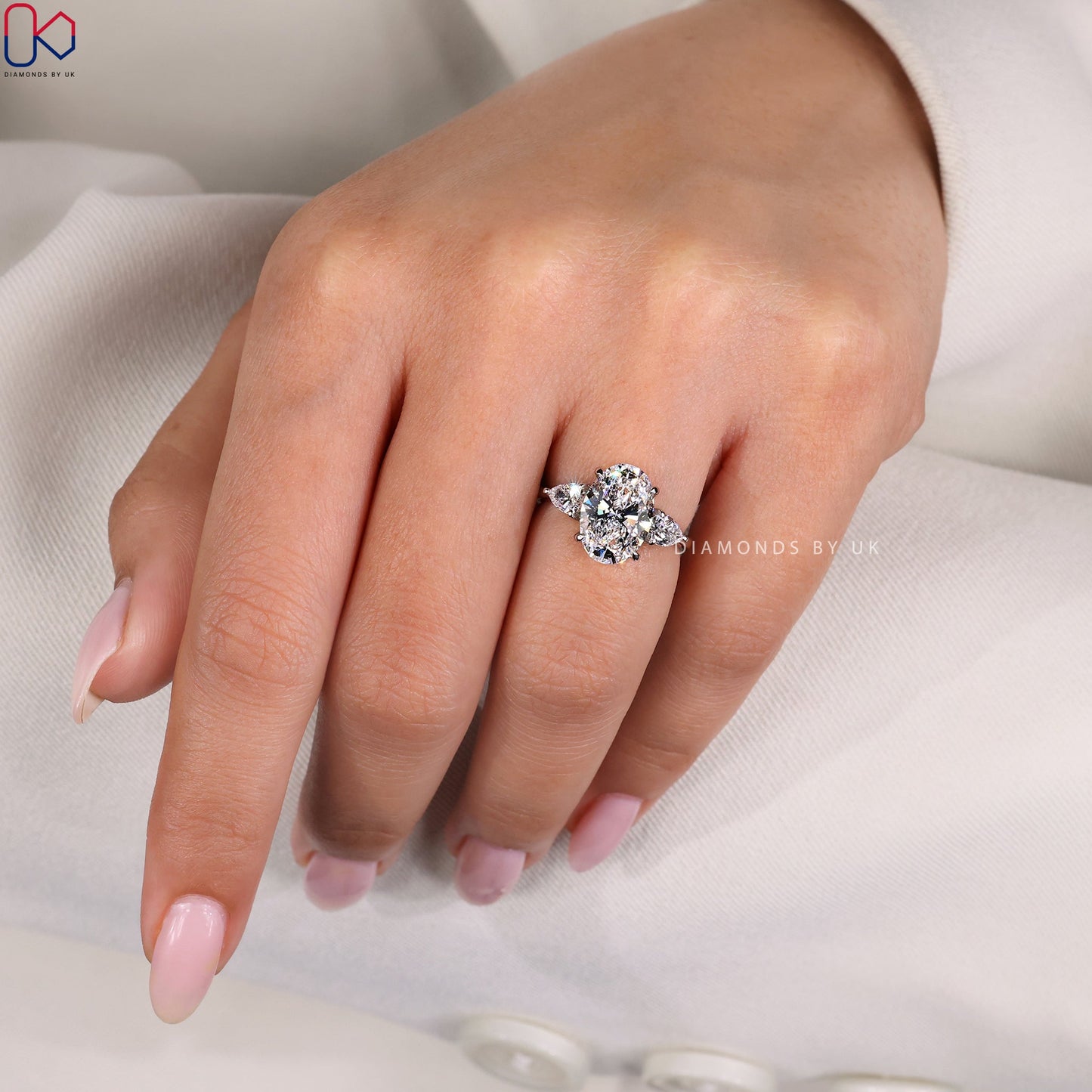 Oval Cut Three Stone Diamond Ring