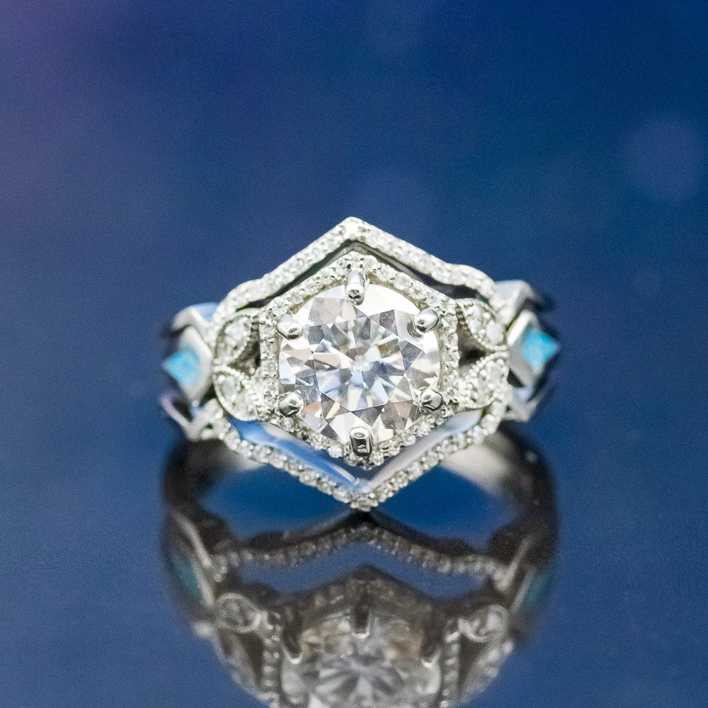 "Lucy In The Sky" - Round Cut Moissanite Engagement Ring With Diamonds, Turquoise Inlays & A Diamond Tracer