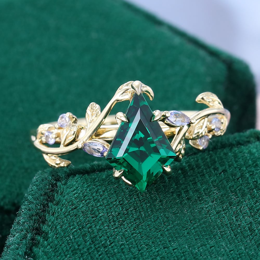 LeafLace | Kite Cut Emerald Engagement Ring with Tanzanite Accents