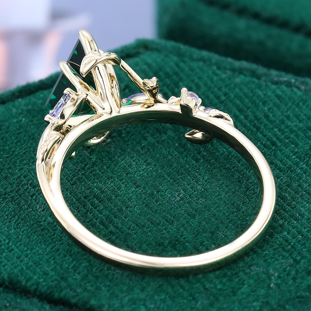 LeafLace | Kite Cut Emerald Engagement Ring with Tanzanite Accents