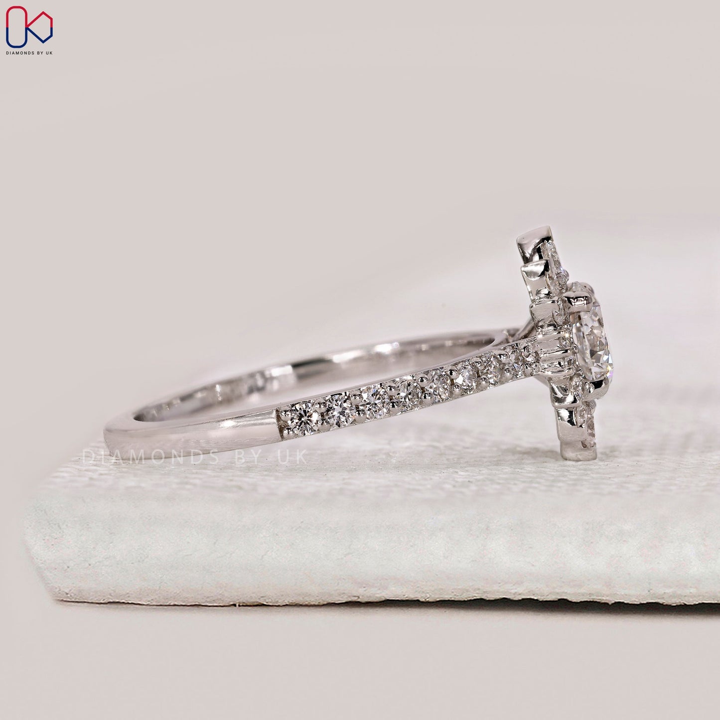 Round Cut White Gold Diamond Ring in Pave Setting