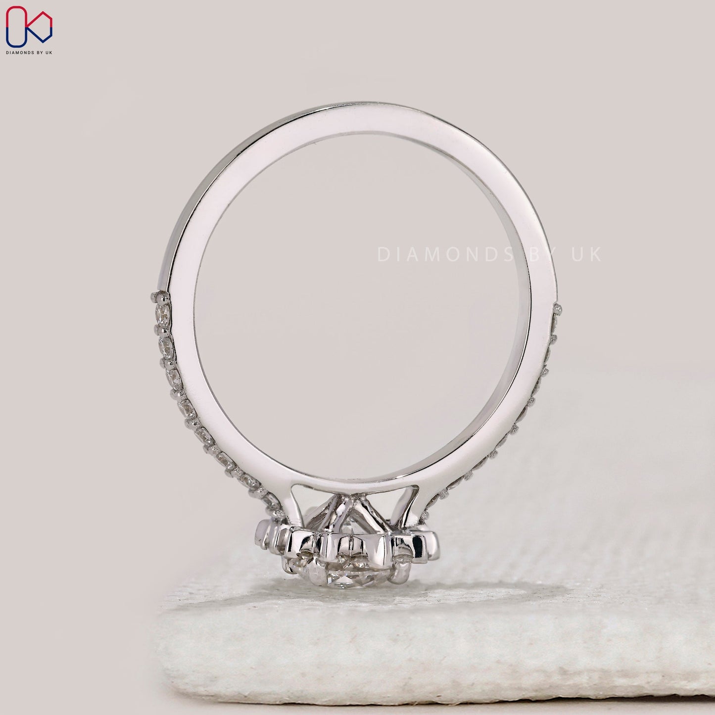 Round Cut White Gold Diamond Ring in Pave Setting
