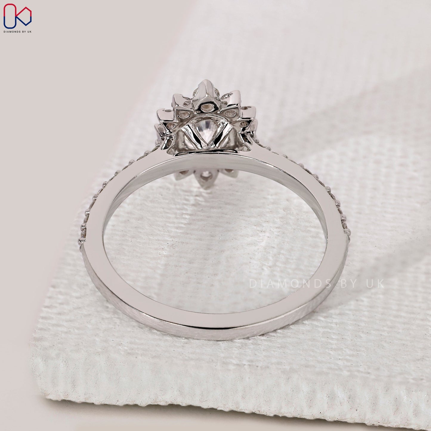 Round Cut White Gold Diamond Ring in Pave Setting