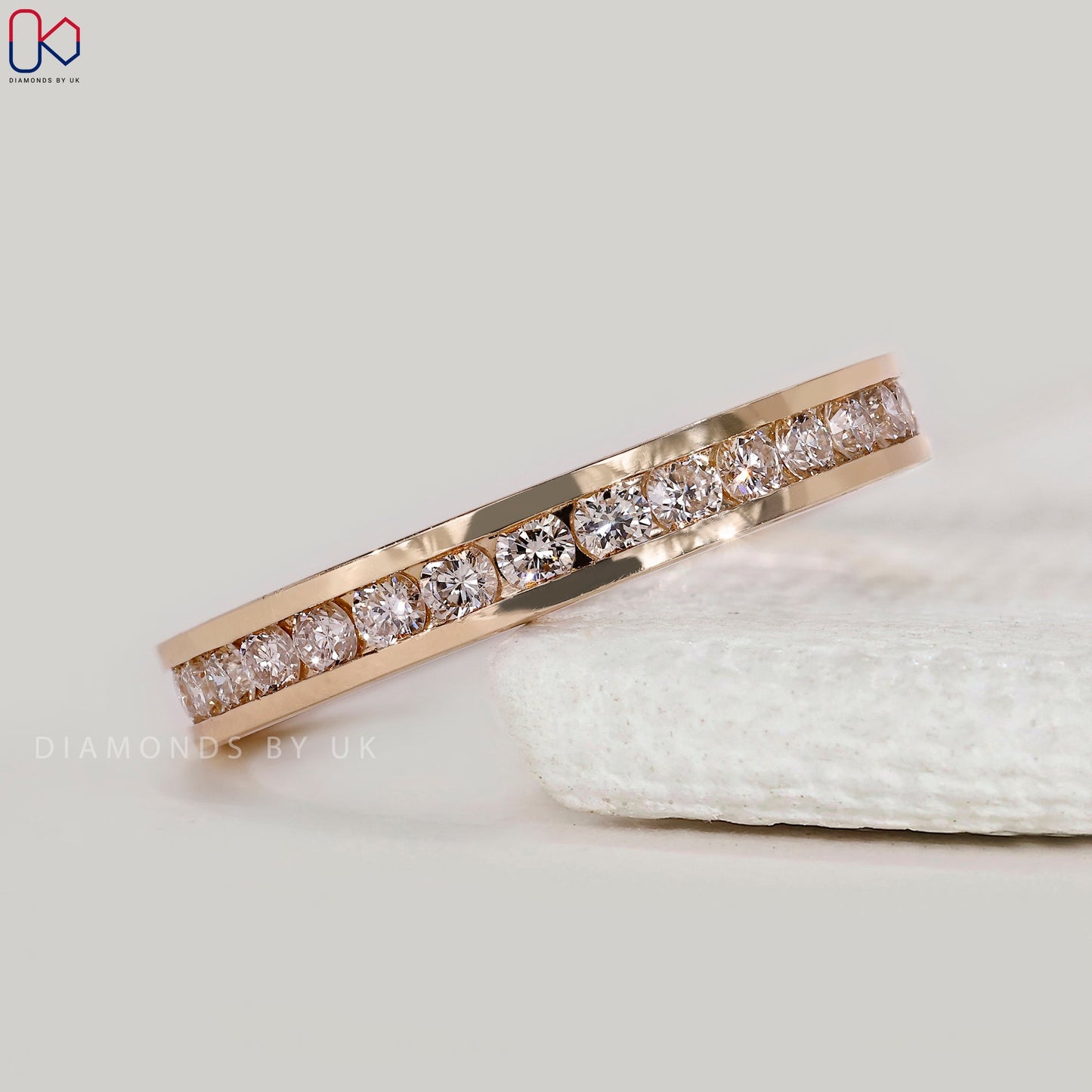 Yellow Gold Channel Set Round Diamond Band