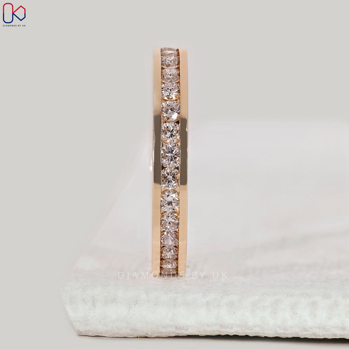 Yellow Gold Channel Set Round Diamond Band