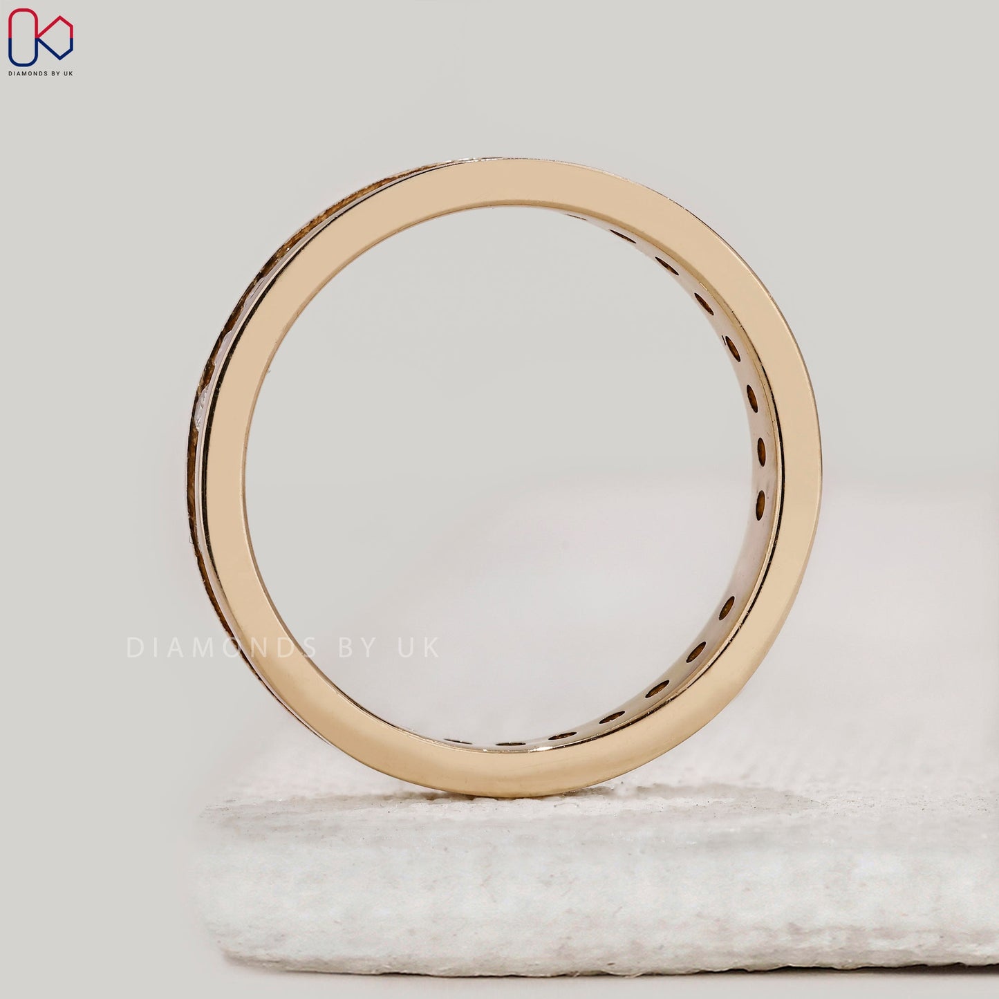Yellow Gold Channel Set Round Diamond Band